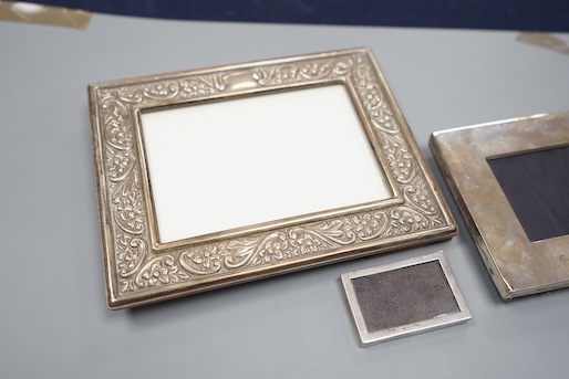 Three modern silver mounted photograph frames, largest 17.9cm.
